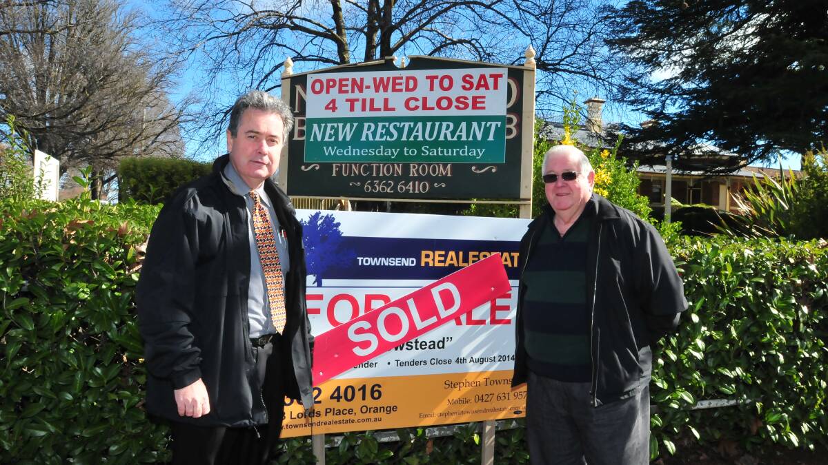 SOLD: Newstead Bowling Club chairman Gary Norton and treasurer Leo Hevers are pleased with the sale price achieved on Wednesday night. Photo: JUDE KEOGH                                                                                                                                                                                         0807newstead1