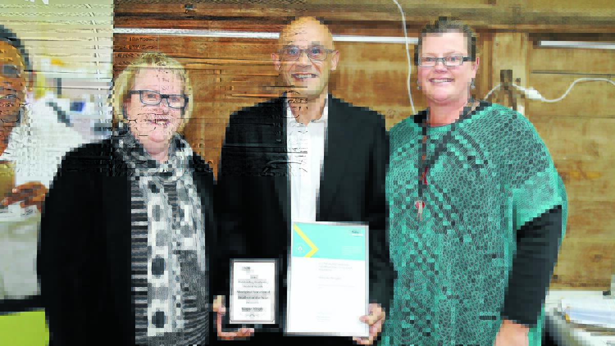 AWARD DOUBLE: TAFE Western Institute director Kate Baxter, Aboriginal student of the year Wayne Wright from Orange, and TAFE teacher Sharna Wright. Photo: CONTRIBUTED              0527tafe1