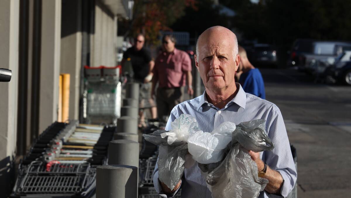 BAG BAN: Orange Councillor Neil Jones hopes Wednesday’s Federal Senate Inquiry report which recommended NSW ban single use lightweight plastic bags will convince Premier Mike Baird to change his stance on the issue. 
Photo: PHIL BLATCH  0421pbbags4
