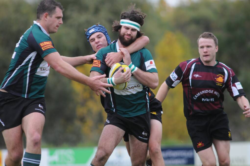 WITH ENVY: Emus winger Tom Green proved more than a handful for Parkes in the Orange club’s crushing win over the Boars last weekend. 
Photo: STEVE GOSCH 0426sgrugby2