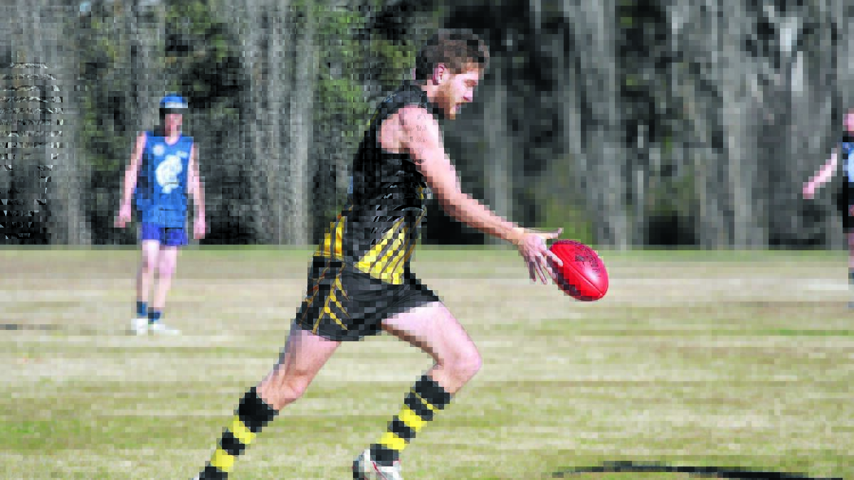 HUGE WIN: Orange Tigers star Ben Monaghan moves the ball forward in his side's 266-point win over Cowra on Saturday. Photo: STEVE GOSCH 0809sgafl2