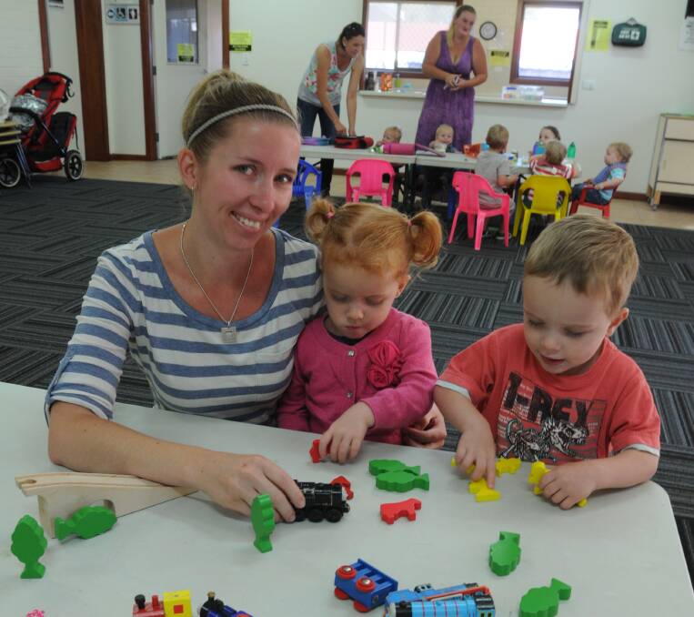 DOUBLE TROUBLE: Rebecca Wignall, pictured with her twins Hannah and James, knows how scary it can be to hear you are expecting multiple babies but wants Orange parents to know there is help available. Photo: STEVE GOSCH    0304sgmulti2