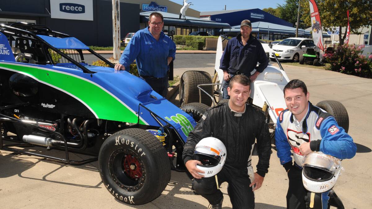 BROTHERLY LOVE: Getting set for the Gilgandra Speedway are Inwest Wood Engineering’s (back, left) Brett Innes and Rick Jones and brothers (front, left) Kiel and Joel Swadling. Photo: STEVE GOSCH                                                                                                                                              0221sgspeedway
