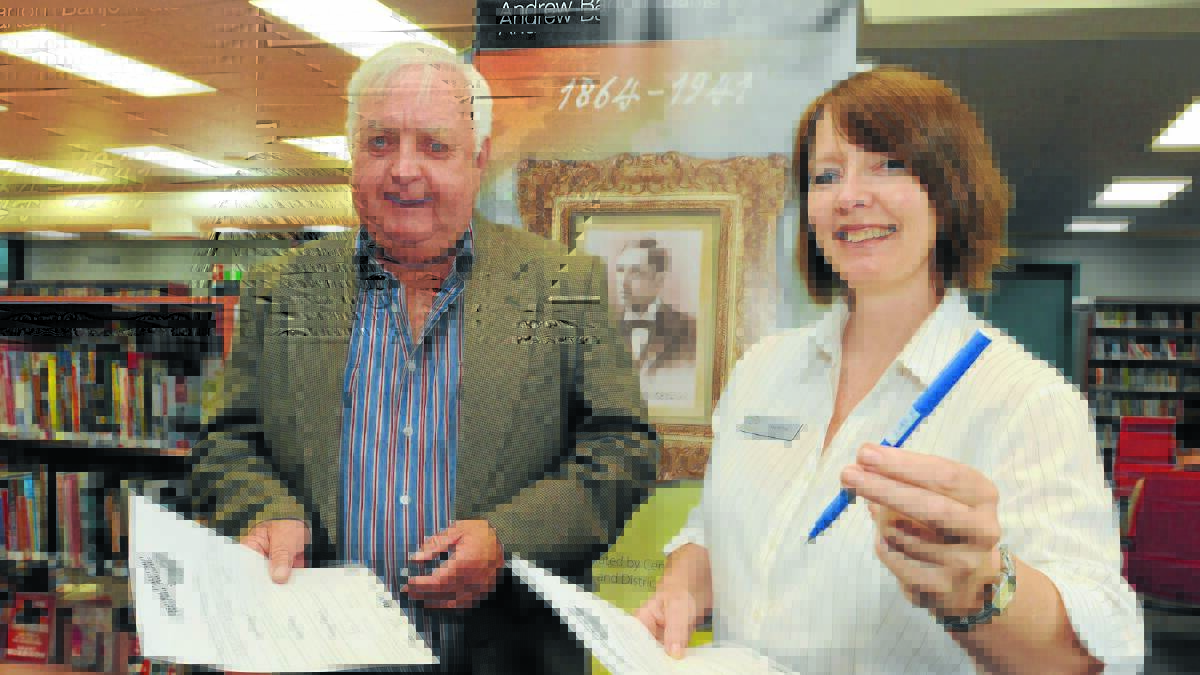 TELLING TALES: Orange City councillor Ron Gander and Central West Libraries reading and writing co-ordinator Jasmine Vidler are ready to launch the Banjo Paterson Writing Awards today. Photo: JUDE KEOGH           0216banjowriting1
