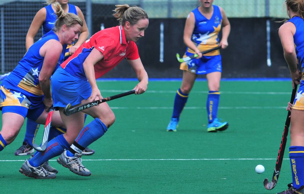 GOOD PROSPECTS: Even after losing former skipper Jess Marsh (pictured), Confederates will be competitive in 2014 according to Premier League Hockey president Adam Hurford. Photo STEVE GOSCH 0323sghock3