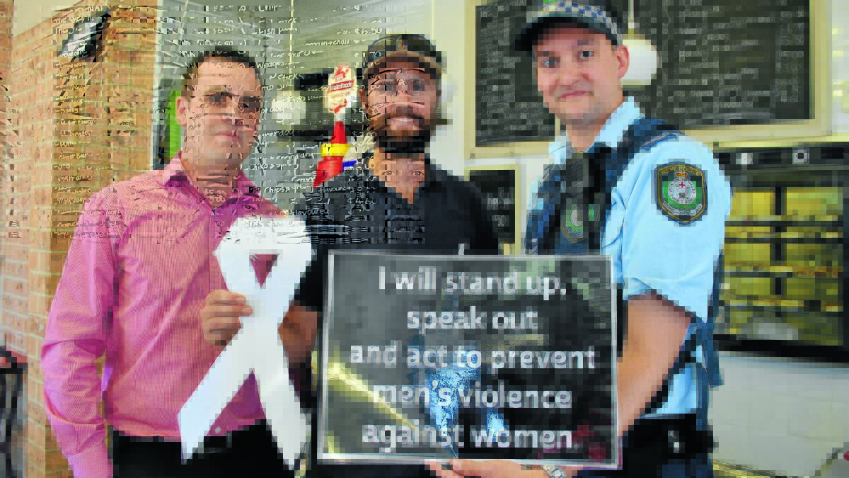 POSITIVE ACTION: Housing Plus chief operating officer Steve Stanton, Smoko Shed owner Nick Cunial and Canobolas Local Area Command domestic violence liaison officer Senior Constable Granton Smith are making a stand against violence against women and are encouraging other men to get on board the White Ribbon campaign. Photo: TANYA MARSCHKE 