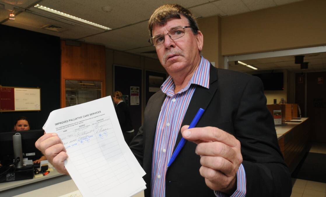 PALLIATIVE CARE PUSH: Orange City councillor Glenn Taylor wants Orange residents to sign a petition pushing for better palliative care facilities.
Photo: STEVE GOSCH 1119sgpetition1 
