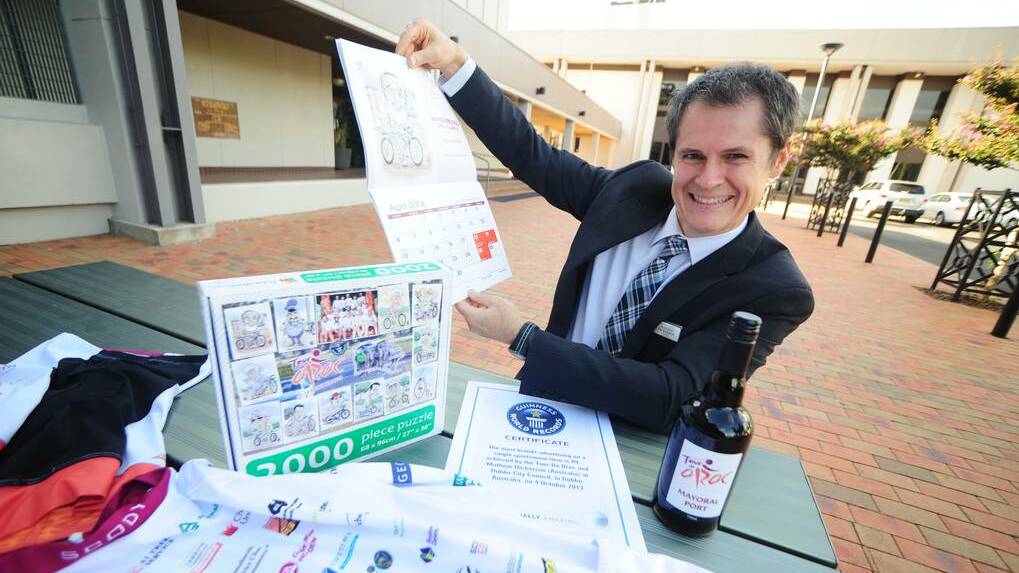 DUBBO: Dubbo mayor Mathew Dickerson takes another look at Tour de OROC paraphernalia after advising of a meeting on March 27 to form an organising committee.	 Photo: BELINDA SOOLE