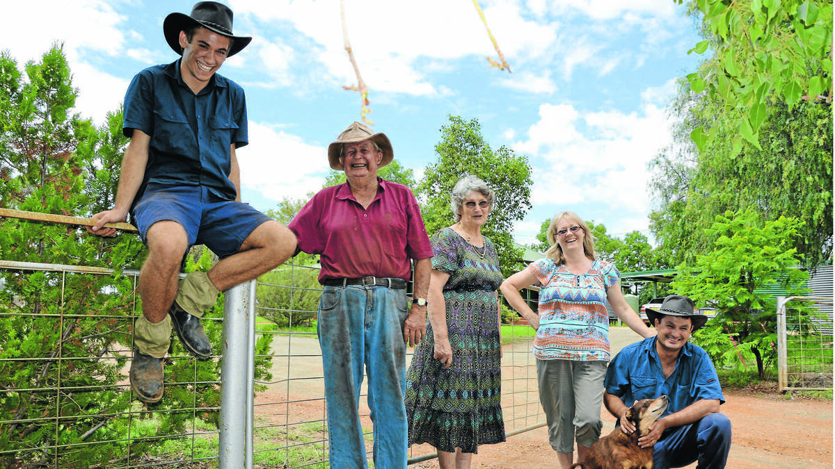 PARKES: Farmers Hayden, Cliff, Helen, Alison and Neil with their kelpie Buttons. Photo: Bill Jayet
