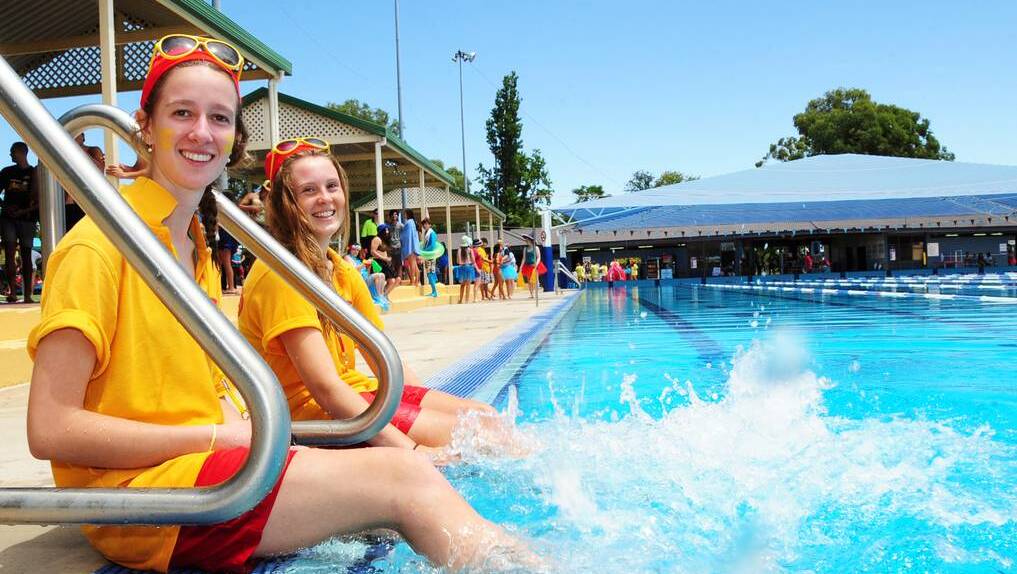 Dubbo residents are set to follow the lead of Dubbo College Senior Campus students DUBBO: Jessica Parmeter and Hannah May as the temperature rises again. The students were cooling off at the senior campus swimming carnival yesterday. Photo: BELINDA SOOLE