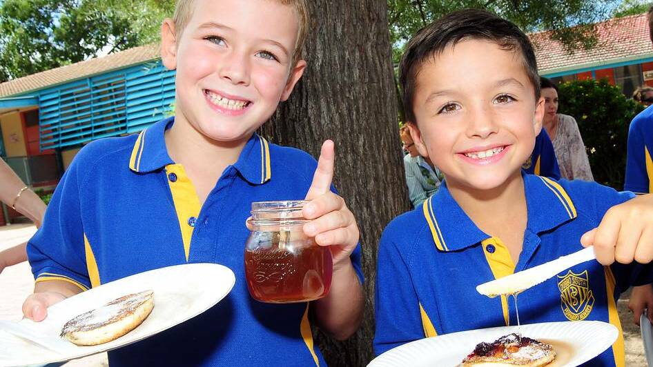DUBBO: Jackson Dowd and Bentley Day enjoyed the pancake feast at South Dubbo Primary School.	 Photo BELINDA SOOLE