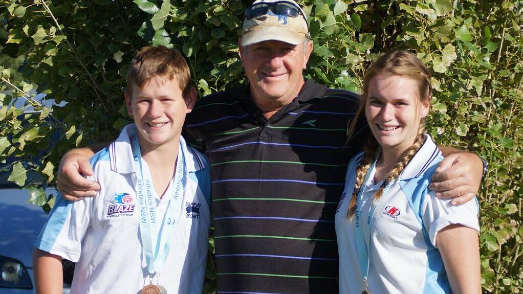 NARROMINE: Aiden Butcher, coach Ernie Sluiter and Kaitlin Butcher are excited about nationals after they competed in the NSW Athletics Junior State Championships. 
