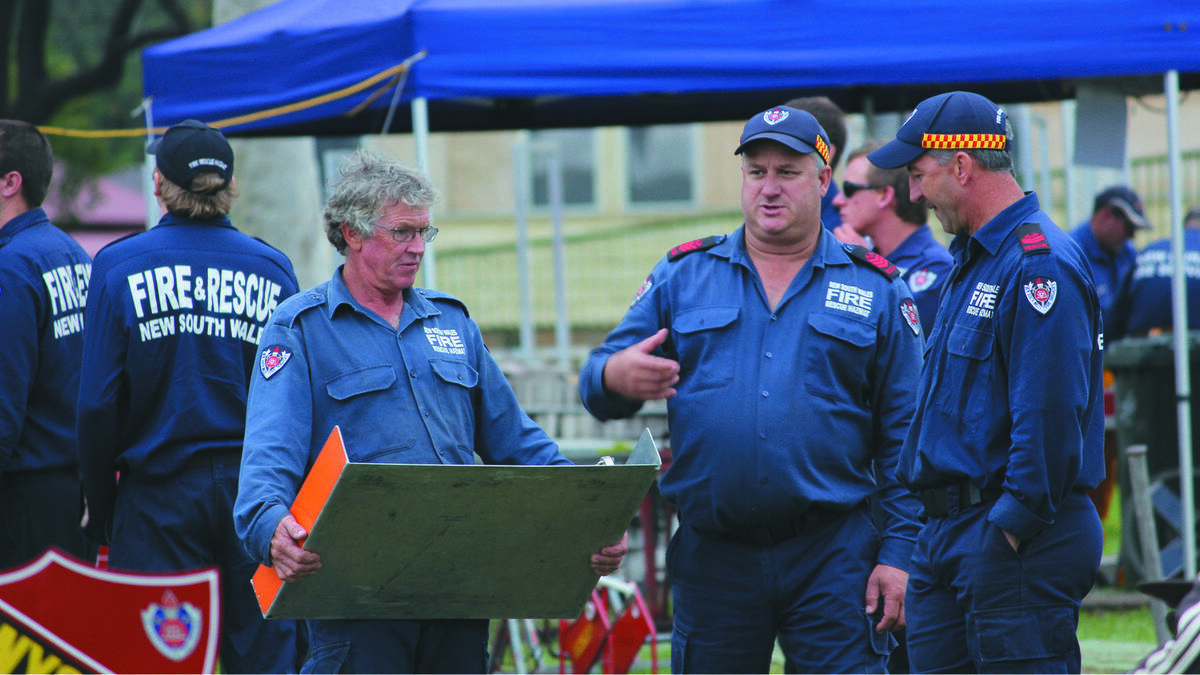 FORBES: Duncan Williams, Mark Willis and Brendan Hayes from Forbes Fire and Rescue NSW talking tactics.