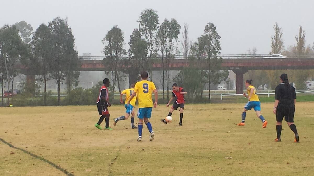 The Boy's Soccer was played in the rain. Photo: SARAH TOOHEY