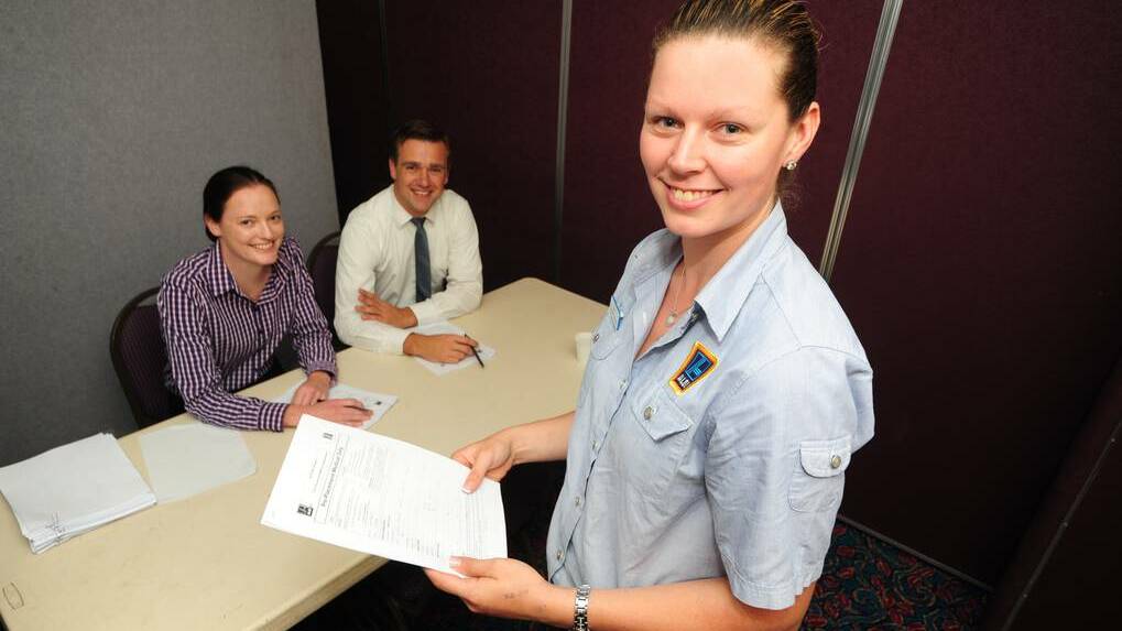 DUBBO: Bec Leven, Narelle Taylor and Robert Eichfeld sift through more than 150 applications for Dubbo s upcoming Aldi store. Photo: BELINDA SOOLE