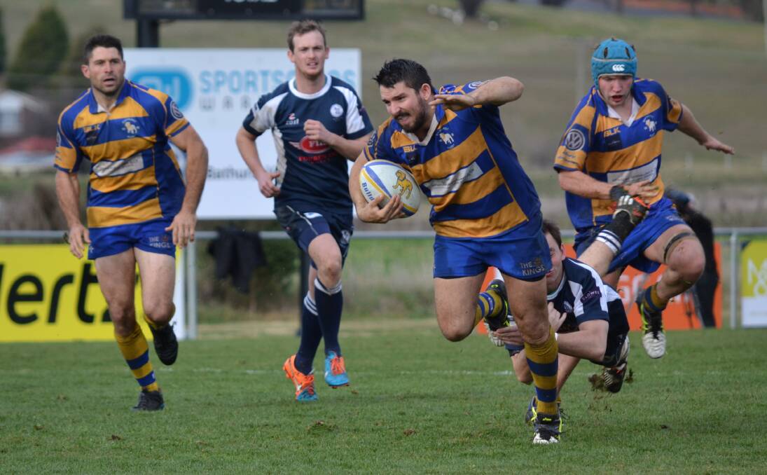 PLATYPI PERSIST: Bathurst's Jack Roberson almost breaks through Forbes' line in Saturday's match at Ashwood Park. Photo: ALEXANDER GRANT 061816agdogs1