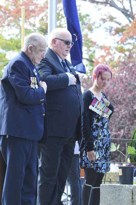 ANZAC DAY: Les McGaw, Lindsay Wright with Les Frost's neice Chloe Morgan 
