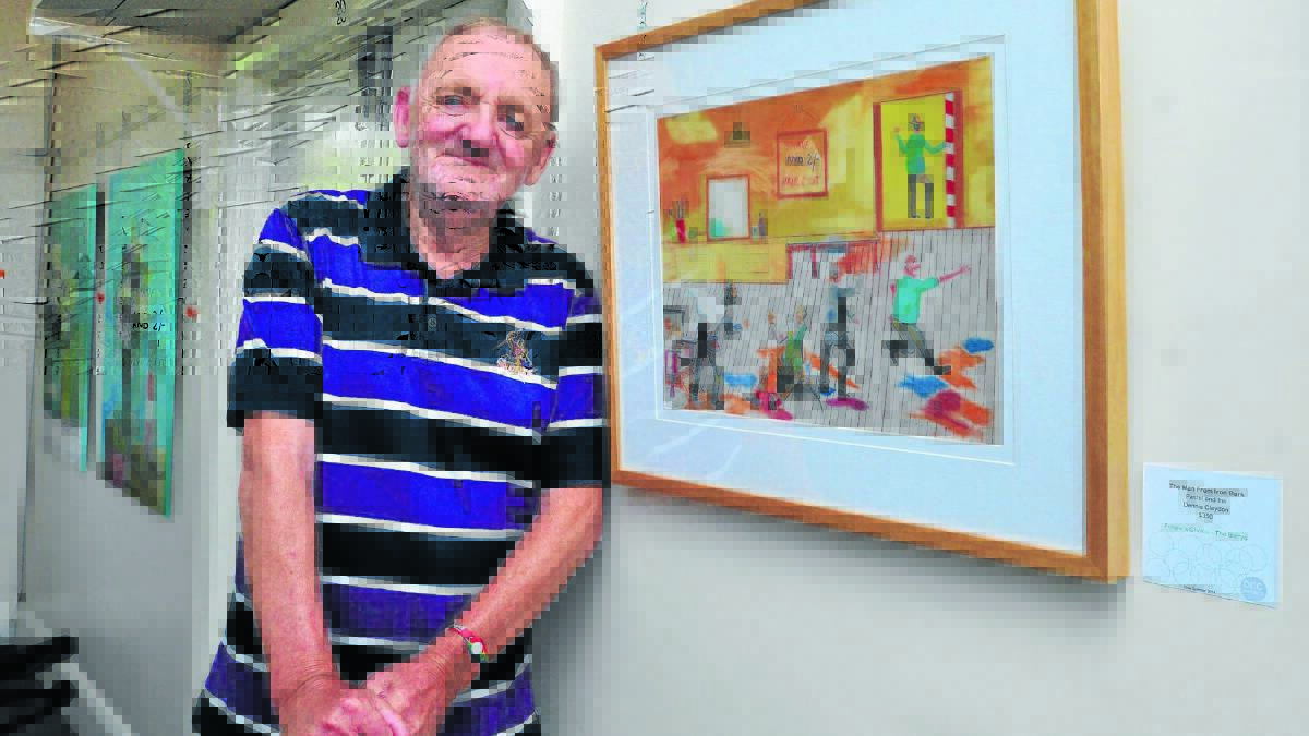 FUN OR SERIOUS?: Artist Dennis Claydon said his Banjo Paterson inspired artwork definitely fell into the fun category. It forms part of a new exhibition to open tomorrow night. Photo: JUDE KEOGH       0206banjoexhibit1
