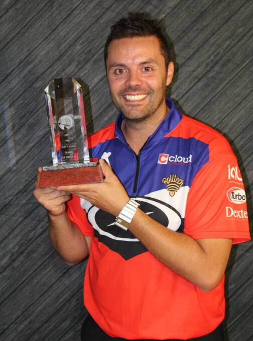 TOP DOG: Orange's Jason Belmonte shows off the Professional Bowlers Association Player of the Year trophy he won for a memorable 2014. Photo: PBA.COM