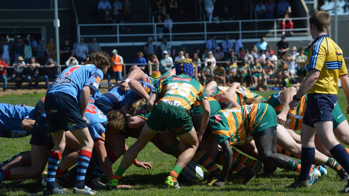 NO MORE PENALTIES: Orange City and Dubbo 'Roos scrum it down in last year's colts preliminary final. Both teams are strong again, but now sides struggling for numbers won't be punished should they forfeit. 
							       Photo: MATT FINDLAY 0913mfcolts14