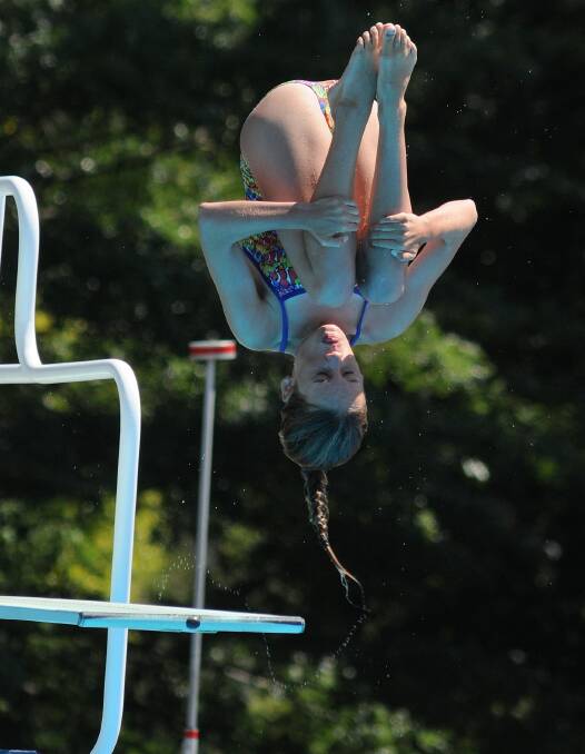 IN A SPIN: Julia Williams of Diving North Coast in the 14/15 years girls’ and boys’ three metre event on Sunday. Photo: STEVE GOSCH 0125sgdive2