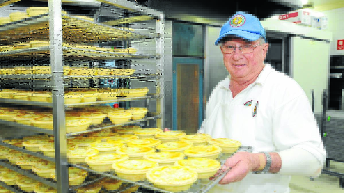 LAST BATCH: Bob Hamilton hung up his baker’s hat for the last time yesterday, retiring from his job at Roberts Bakery after 49 years in the business. Photo: STEVE GOSCH 0716baker2
