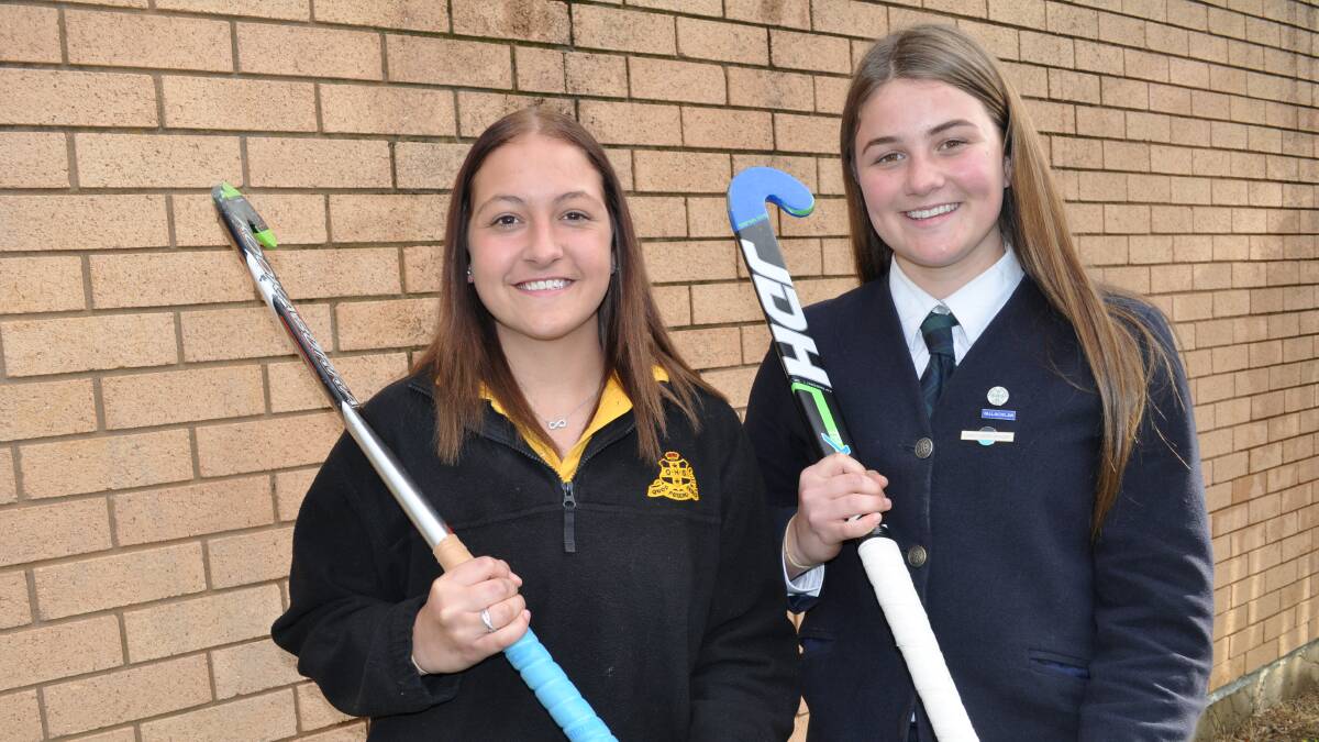 DOUBLE TROUBLE: Tiff Davis and Ally Thurn are pumped to be touring New Zealand next month. Photo: NICK McGRATH 0828nmhockey1