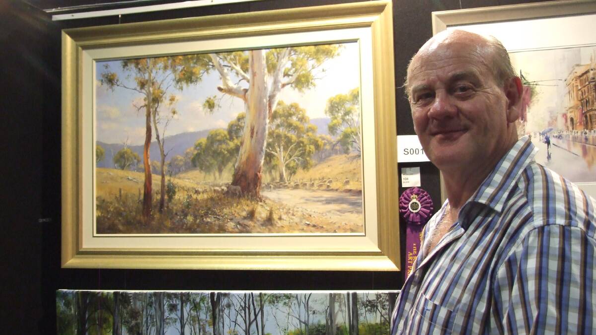 OPHIR GOLD: Ophir artist Ted Lewis was delighted to win first prize in the traditional landscape section at the Sydney Royal Easter Show.
 Photo: SUPPLIED 0325tmart1
