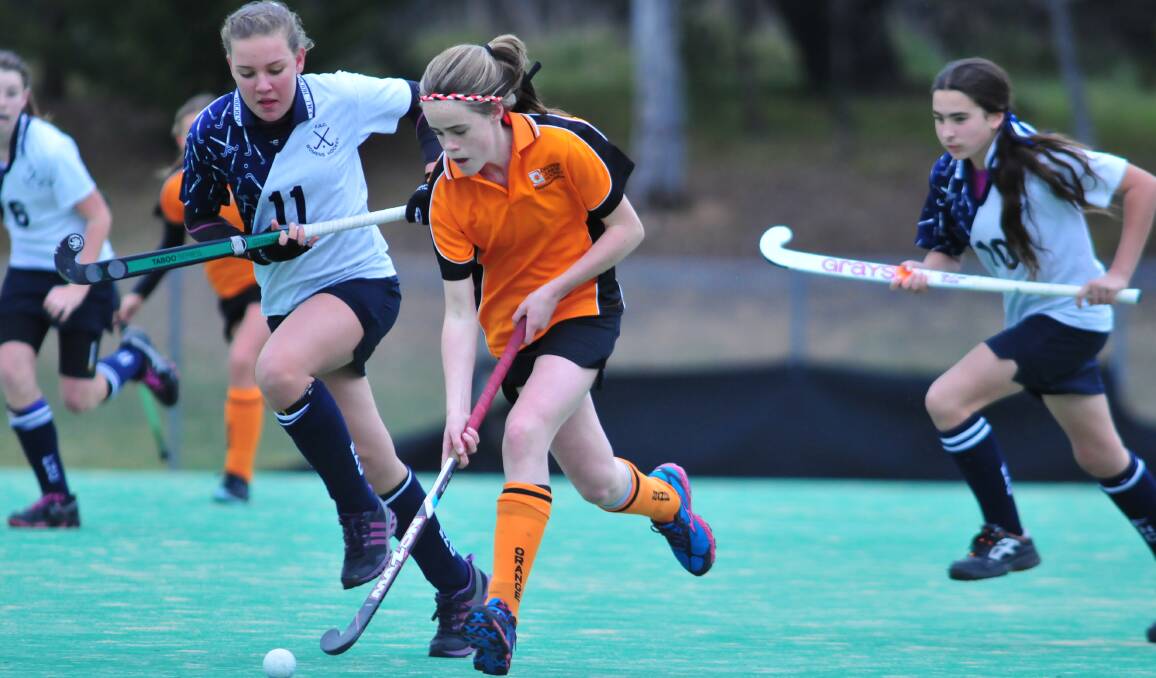 FINAL FOUR: Orange gun Libby Smith pictured in action during her side's state championship campaign on Saturday. Photo: JUDE KEOGH 0712hockey7