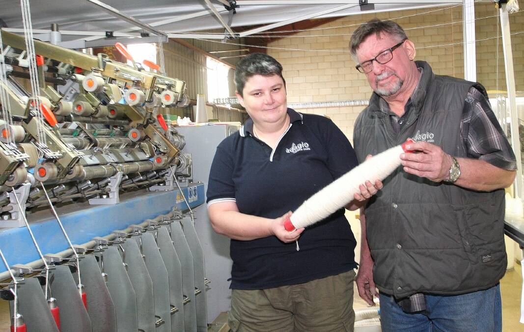 COME HAVE A YARN: Spinner operator Emma Brien and production manager Steve Vandenbergh from Adagio Mills will share their expertise at an open day on Saturday, May 7. Photo: STEVE GOSCH  0502sgalpaca1