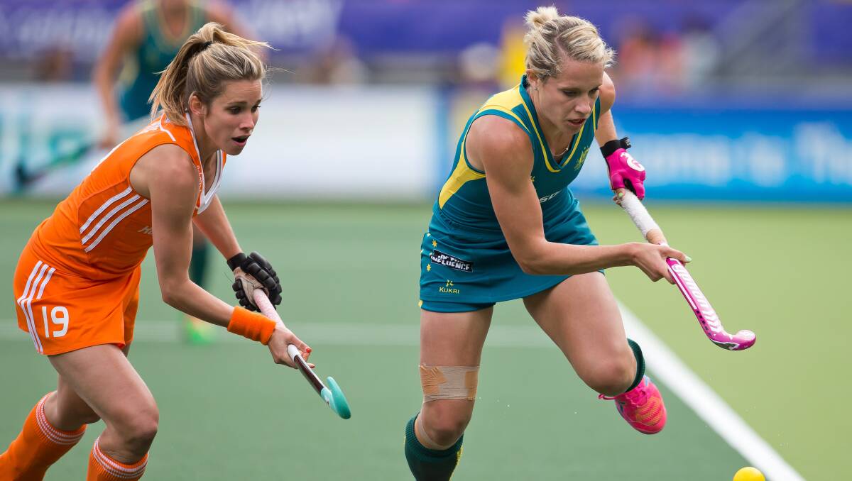 OLYMPIC DREAM: Edwina Bone (right) and her Hockeyroos teammates take on Great Britain this month. Photo: GRANT TREEBY/TREEBY IMAGES