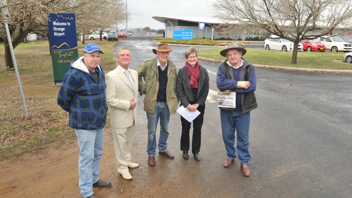 WATER CONCERNS: Spring Hill and Surrounding Districts Consultative Committee members Robert Sanders, Bill Fennell, Geoff Howarth, Sally Playfair and Des Redmond. Photo: JUDE KEOGH  0826airport
