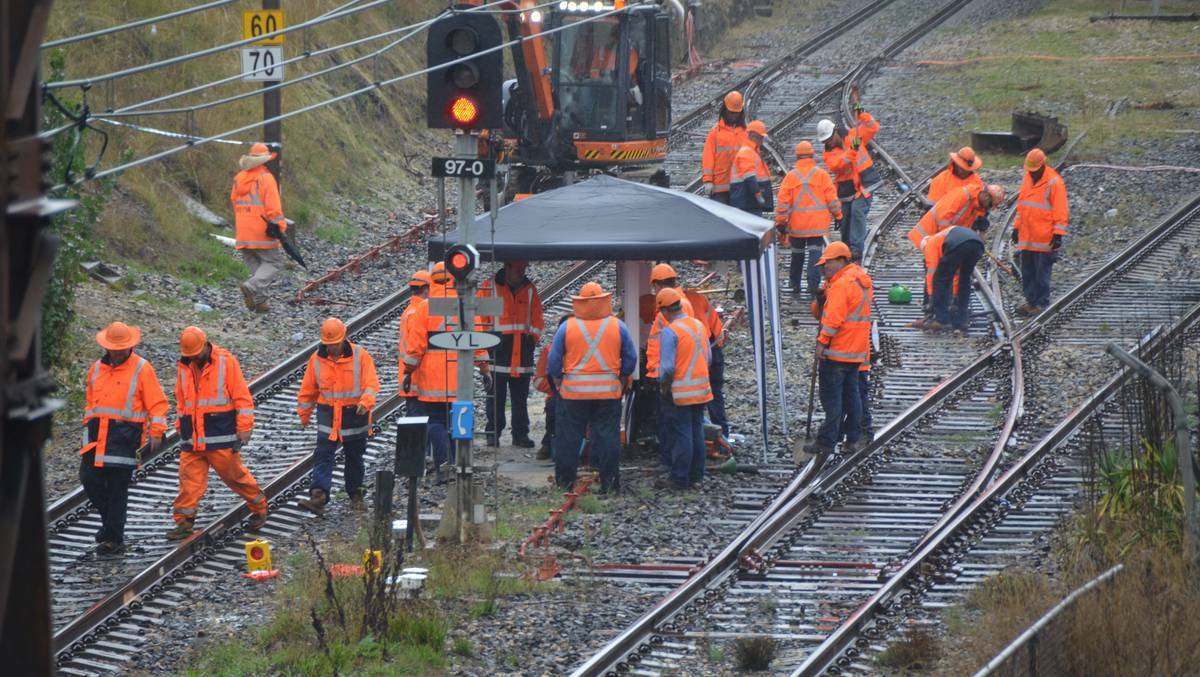 LITHGOW: After weeks of dry weather RailCorp crews had to work in the rain on the latest upgrade program between Lithgow station and Eskbank. lm030714LA8495
