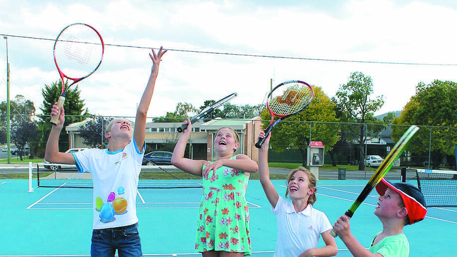MUDGEE: Imogen Kearins, Kaytlyn Dowler, Anthea Kearins and Hugo George at play on Mudgee Tennis Club’s new Hot Shots courts.