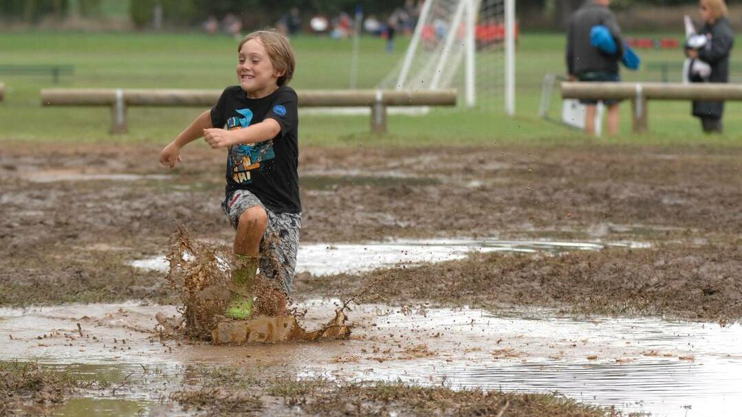 BATHURST: Young Dylan Tasker from Narooma thought the boggy car park at Proctor Park on Sunday was just right for a bit of fun, but it did make life difficult for the hordes of soccer fans who didn’t have a four-wheel drive.