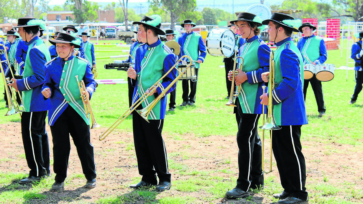 MUDGEE: Members of the Hunter School of Performing Arts Marching Band brass section have some fun during their performance at the Dunedoo Show on Saturday.