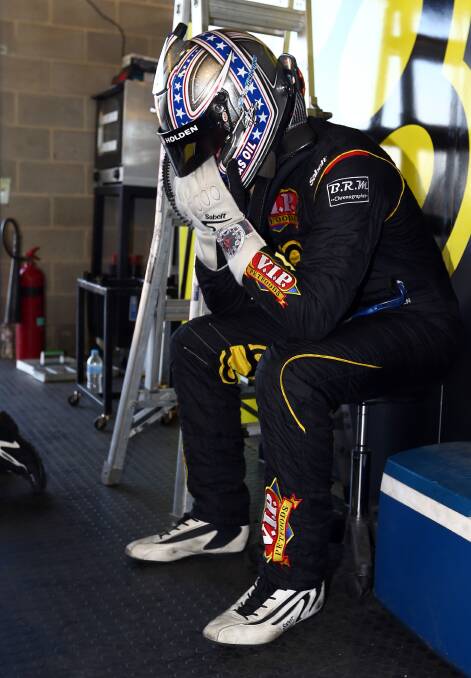 SHATTERED: Shane van Gisbergen in his garage at the end of last year’s Great Race. Photo: GETTY IMAGES