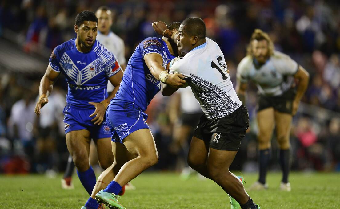 HIT UP: Visa issues are delaying the arrival of prop Osea Sadrau to Bathurst to link with Group 10 club Bathurst Panthers, but on Saturday he lined up for his home nation Fiji. Photo: GETTY IMAGES 	050515oscar