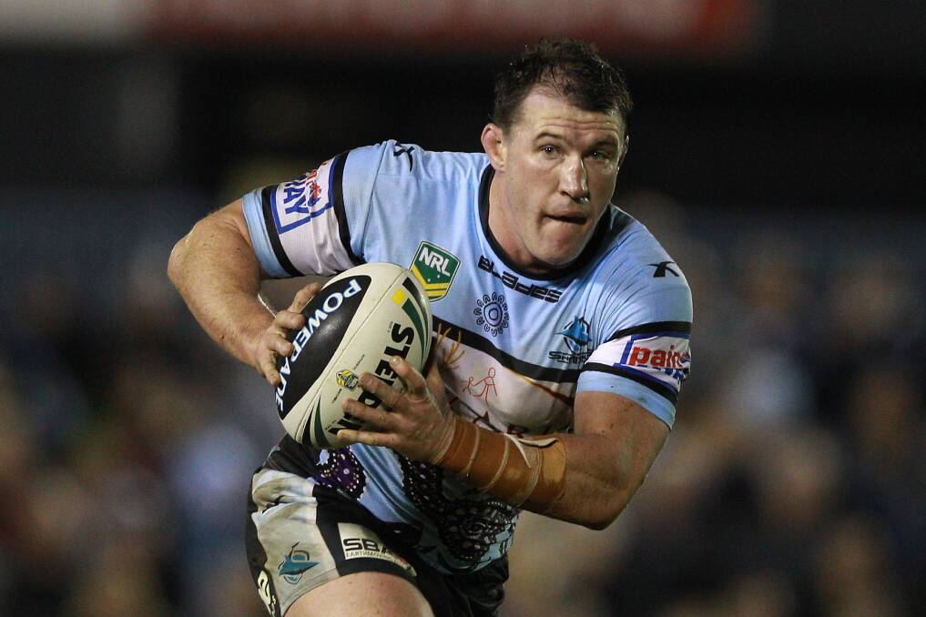 WILL HE OR WON’T HE: Cronulla skipper Paul Gallen says an injured bicep will keep him from taking part in today’s NRL match in Bathurst against the Penrith Panthers. Photo: GETTY IMAGES 	072514gallen