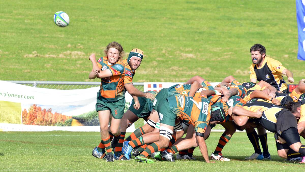 NO HALF MEASURES: Orange City halfback Tom Nell spins it in his side's shellacking of Dubbo Rhinos on Saturday. Photo: BROOK KELLEHEAR-SMITH