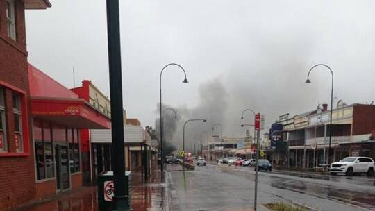 A fire that destroyed a popular Cobar pub has claimed the life of one firefighter and injured another. Photo contributed.