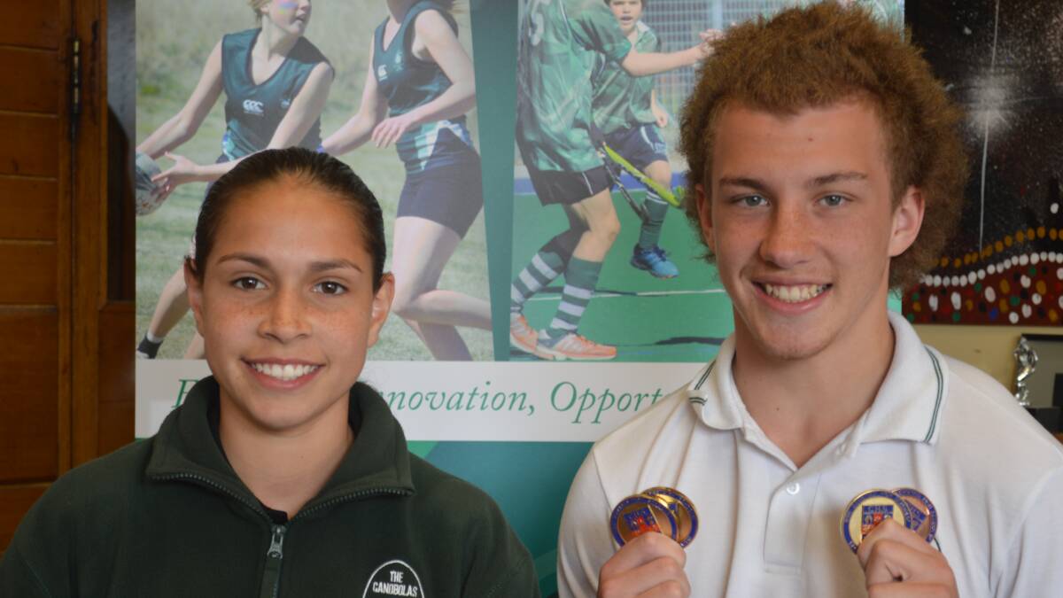 STAR PERFORMERS: Canobolas High's Erin Naden is the school’s latest addition to the Western Region Academy Of Sport netball program, while Jack Connors displays his haul from the NSWCHS athletics carnival. 
Photo: MATT FINDLAY 0909mfnobbies1