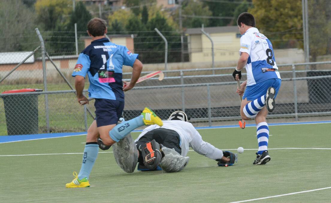 BLUE BLOODS: Bathurst St Pat's proved too good for Bathurst Souths in the 2014 men's Premier League Hockey season opener at the Cooke Hockey Complex on Saturday. Photo: PHILL MURRAY