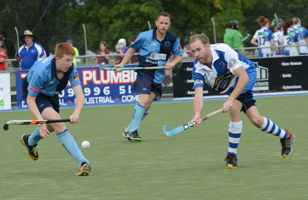 BLUE BLOODS: Bathurst St Pat's proved too good for Bathurst Souths in the 2014 men's Premier League Hockey season opener at the Cooke Hockey Complex on Saturday. Photo: PHILL MURRAY