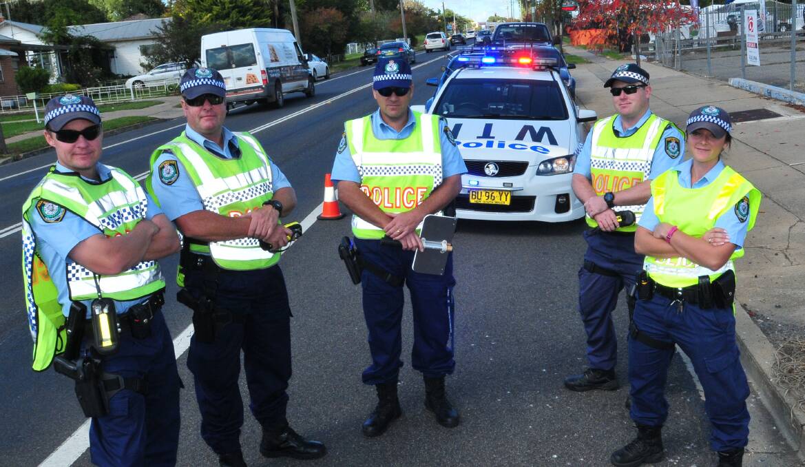 BOYS IN BLUE OUT IN FORCE: Senrior Constable Pearce, Senior Constable Corcoran, Sergeant Blissett, Senior Constable Carters and Constable Rheinberger will be out in force over the long weekends.