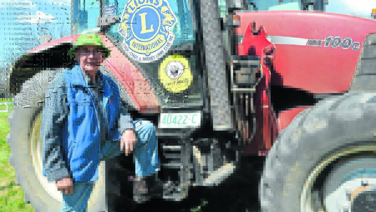 FOR THE KIDS: Cudal's Graham Eslick with his tractor. Photo: DANIELLE CETINSKI. 0920dctractor7