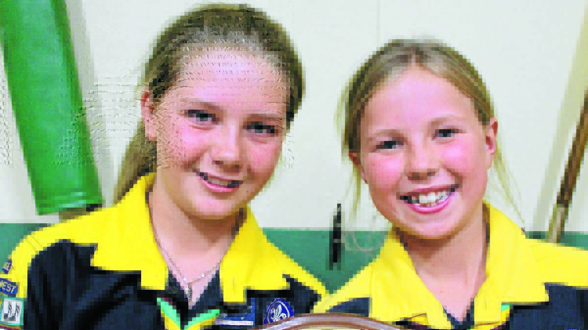 IN IT TOGETHER (right): Eleven-year-olds Liddian Selwood and Morgan Brown received their Grey Wolf awards after 12 months of hard work. Photos: CONTRIBUTED 