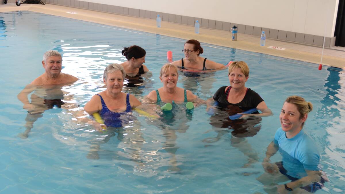 NEW THERAPY: Physiotherapist Amelia Mason (at right) taking patients through their rehabilitation program in the new hydrotherapy pool. (back) Ron O’Brien, Pam Davis, and Denese Dawson and (front) Pam Fliedner, Del Finlay and Lee Pickett. Photo: JANICE HARRIS.1125dudley5
