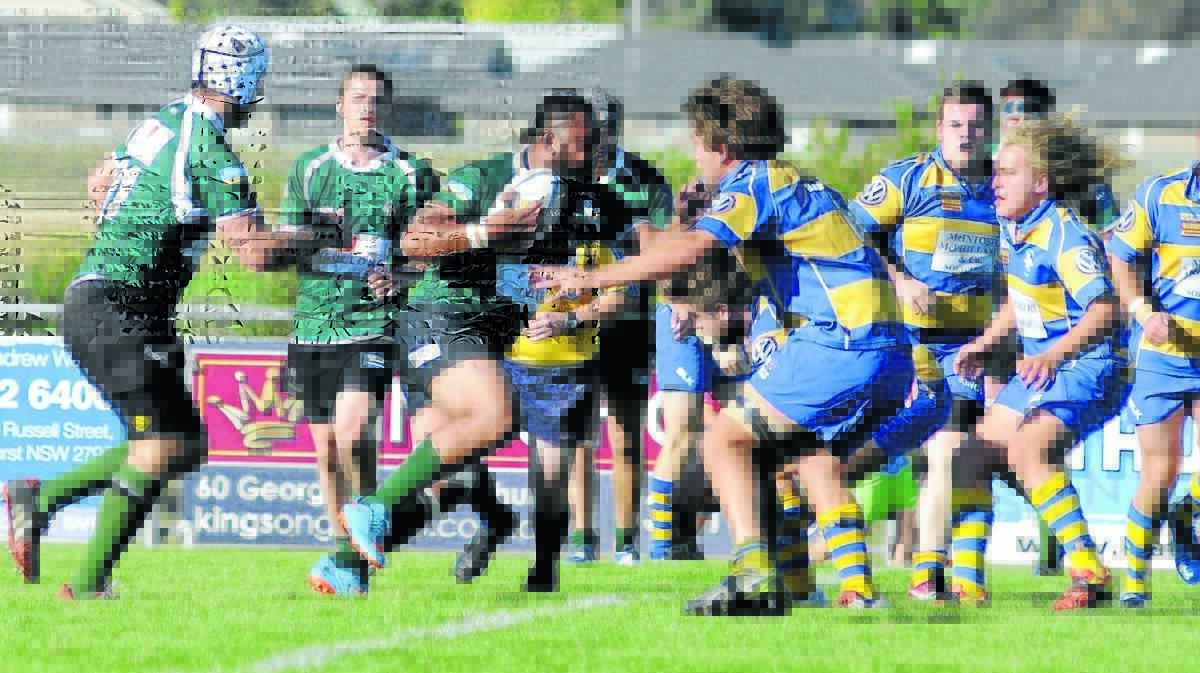 HITTING IT UP: Emus flanker Alo Finau takes the ball up in his side’s big round one win over Bathurst. Photo: CHRIS SEABROOK  

