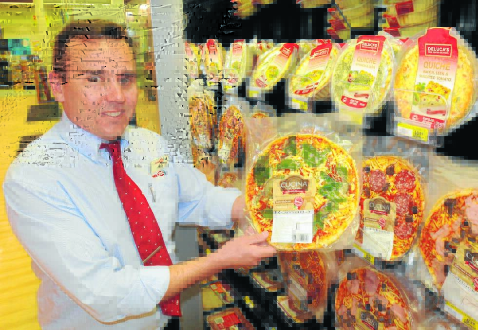 BRANCHING OUT: Ashcroft’s Supa IGA Summer Centre store manager Blaise Linklater shows off part of the new range. 
Photo: STEVE  GOSCH
